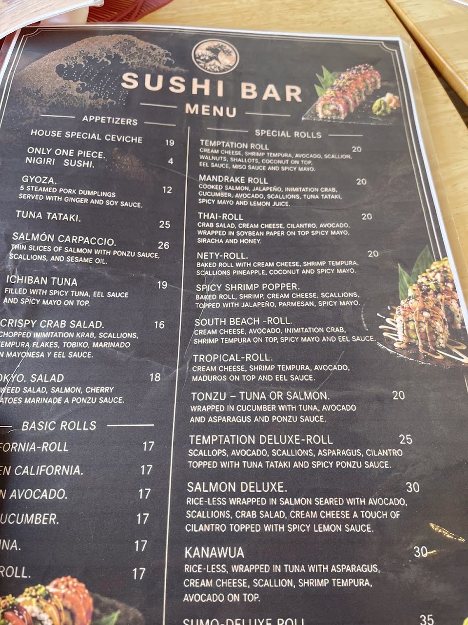 Paella options and seafood plates on display